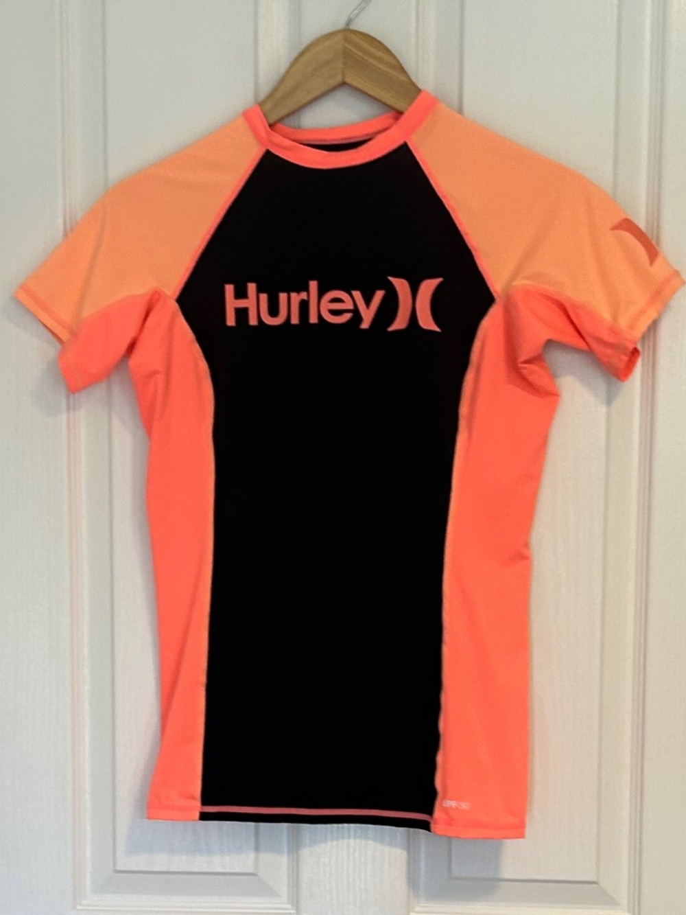 Hurley short sleeve, black, orange and pick, rash guard Sz L